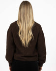 Model in studio wearing Liana Cardi in Chocolate, close-up back view  