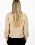 closure  

Model in studio wearing Liana Cardi in Oat, close-up back view  v