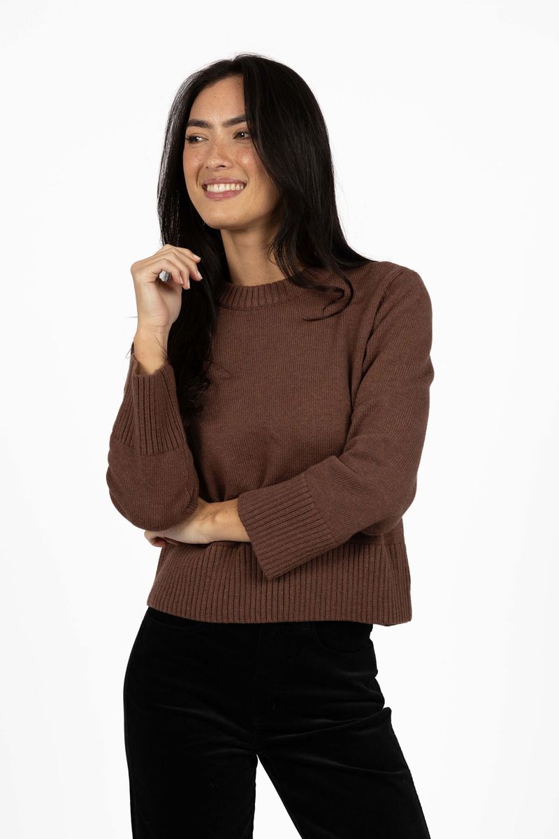 Model in studio wearing Rexie Jumper in Mocha with Va Va Velour Pant in Black, close-up front view 
