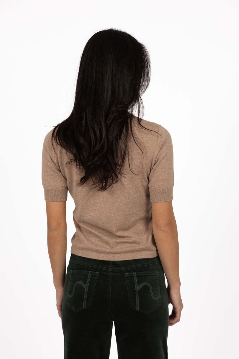 Model in studio wearing Vera Top in Hazelnut with Va Va Velour pant in Navy, close-up back view 