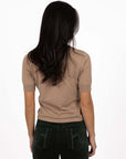 Model in studio wearing Vera Top in Hazelnut with Va Va Velour pant in Navy, close-up back view 