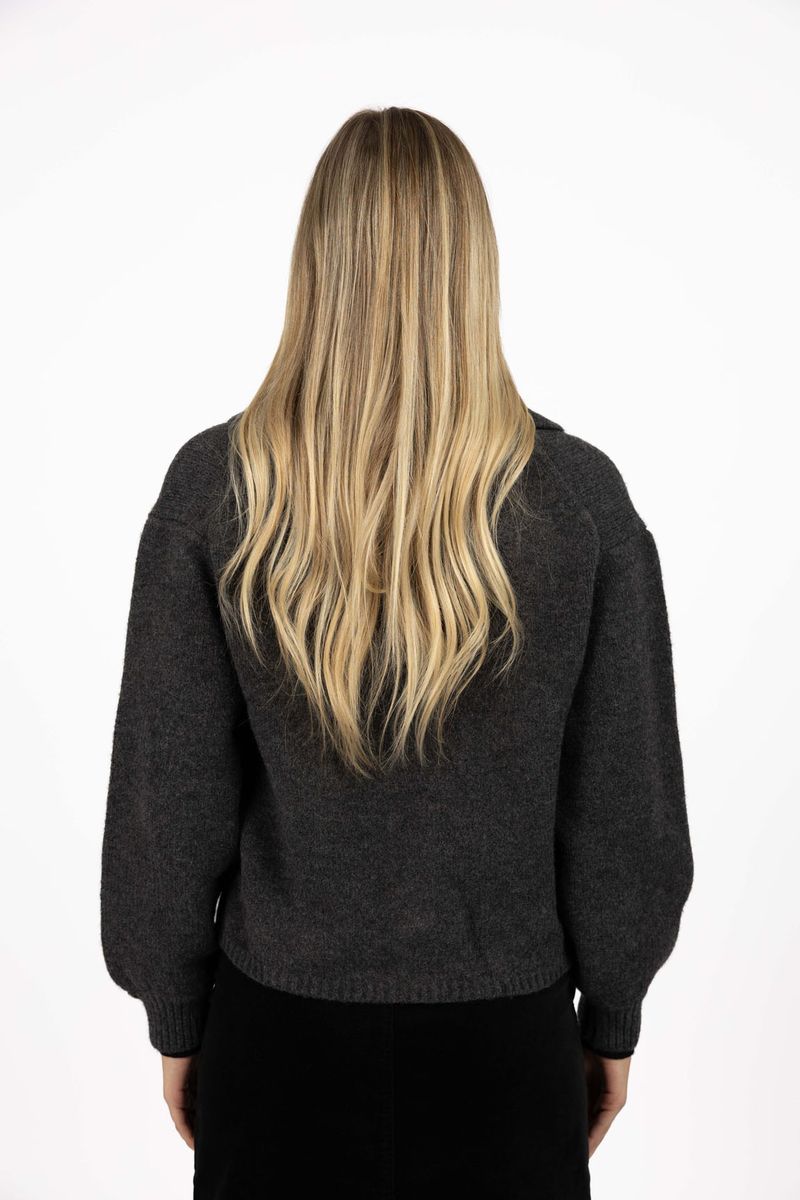 Model in studio wearing Liana Cardi in Charcoal, close-up back view with arms by side 
